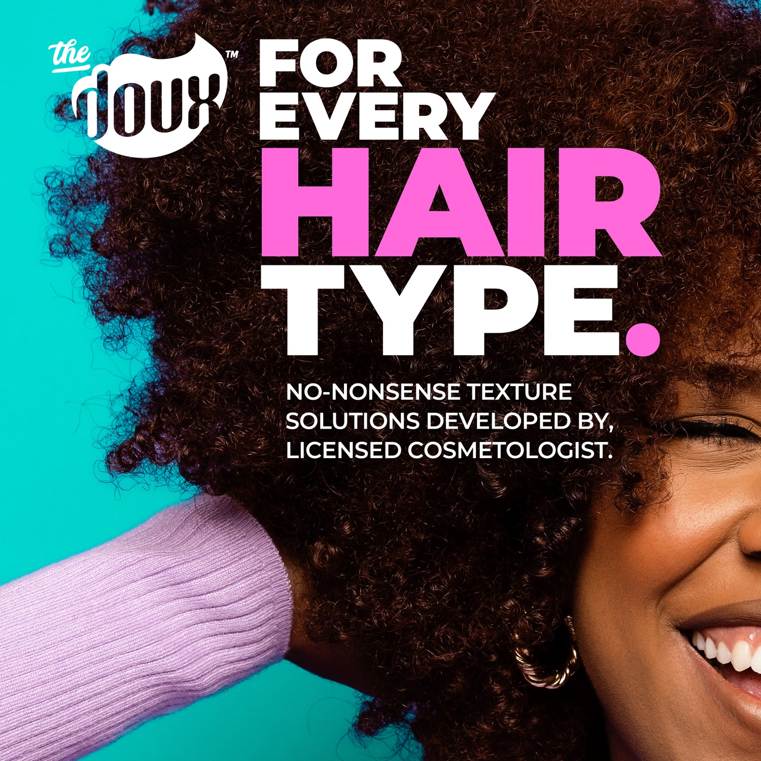 a woman with curly hair smiling